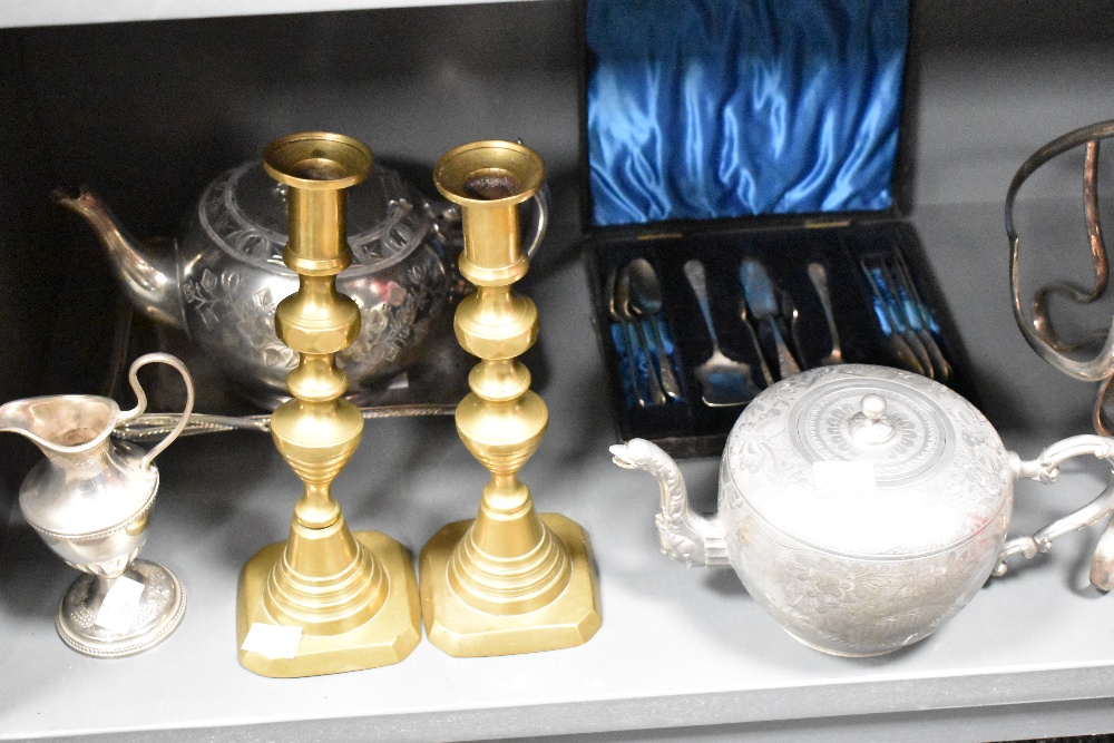 An assorted collection of silver plate and metalware, to include candelabras, cruet stands, candle - Image 3 of 5