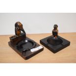 Two circa 1930s wooden ashtrays, both with novelty bird studies to sides, and one with Bakelite