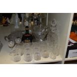 An assortment of glass, including cut glass tumblers, jug, decanters etc, also included is a