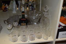 An assortment of glass, including cut glass tumblers, jug, decanters etc, also included is a