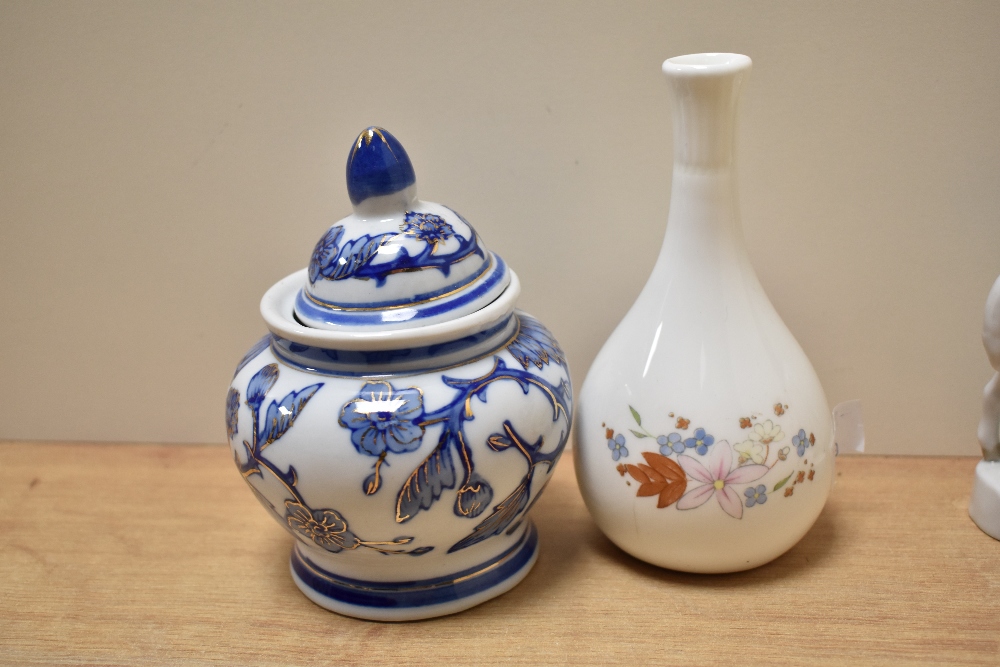 A pair of mid-20th Century German porcelain figural ornaments, a Wedgwood Meadow Sweet bud vase, and - Image 3 of 4