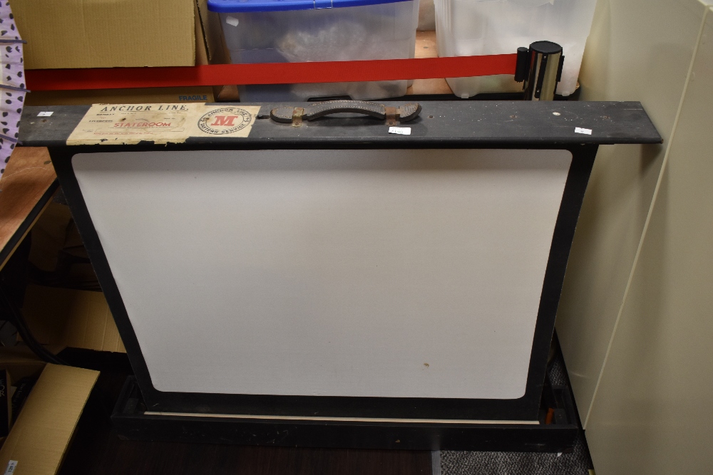 A vintage projector screen, having paper Anchor line, Eastern service, Bombay to Liverpool label.