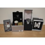 Four watches, as new in boxes, including Newton, Henley, Vialli and Pagani design.