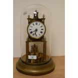 A late 19th / early 20th century brass anniversary clock, by Gustav Becker, having enamelled Roman