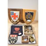 Two 20th Century mounted wall plaques, one for Durham University, measuring 20cm high, and a tray of