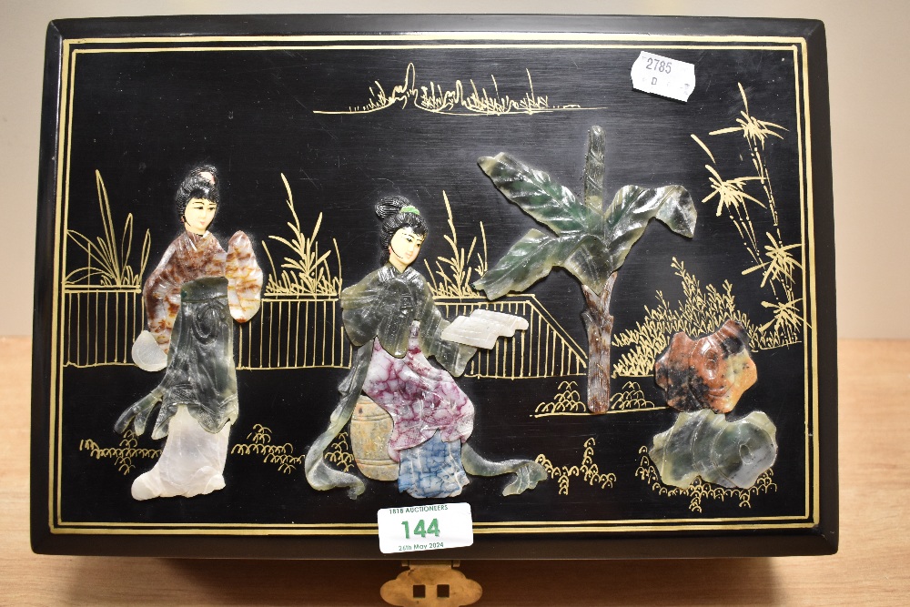 A 20th Century Chinese lacquered jewellery box, with soapstone inlaid decoration, heightened in - Image 2 of 4