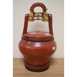 A 19th century Asian red lacquered bucket of wedding basket, having seal mark to lid and metal