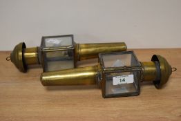 A pair of Victorian brass and glass coach lamps, approx 26cm long.
