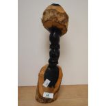 An African carved hardwood bust.