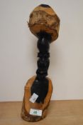 An African carved hardwood bust.