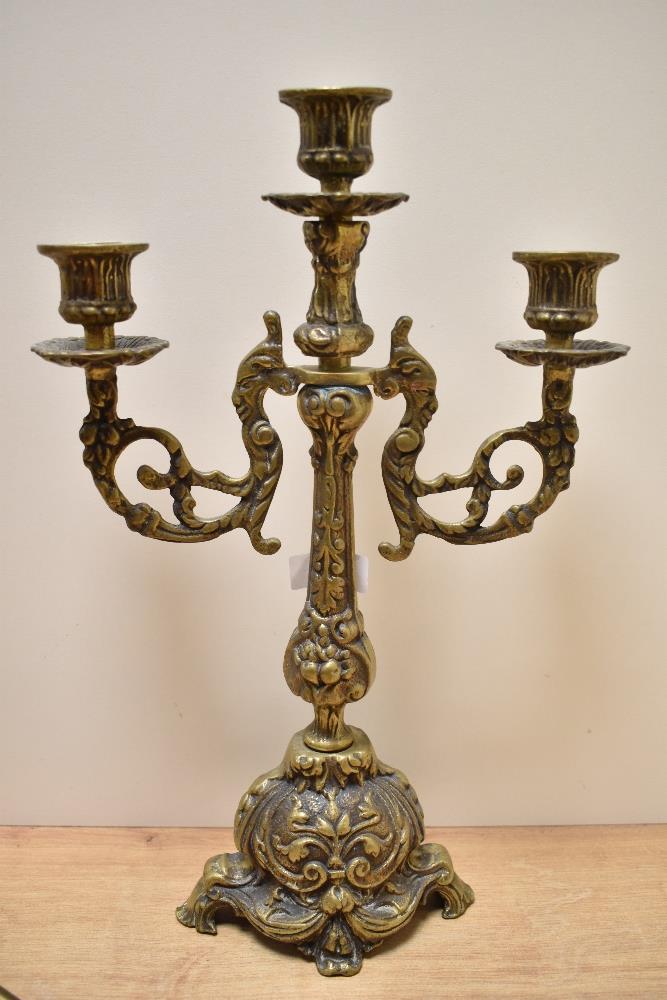 A Victorian brass three branch candelabra, measuring 40cm tall, sold with an ornamental brass - Bild 2 aus 2