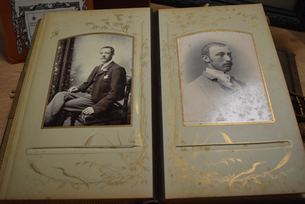 Two Victorian leather bound photograph albums, a framed early 20th Century school photograph, an - Image 2 of 3