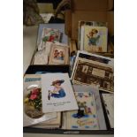 A collection of early 20th Century and later postcards and greetings cards, including depictions