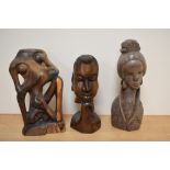 Three 20th century carved hard wood figures, including Geisha.