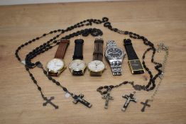 A selection of gents watches, including Timex and Rotary and an assortment of rosary beads.