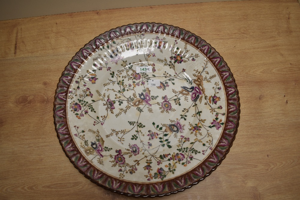 A large continental charger, having hand painted decoration of sprigs of flowers in pinks, brown, - Image 2 of 3