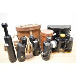 A pair of mid-20th Century Tecnar by Swift 10 x 50 binoculars, another pair of binoculars with Broad