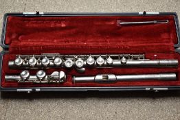 A Yamaha nickel plated three section flute , YFL 211N, cased
