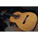 A classical guitar, labelled for Luthiers Tyrell & Preston, Wyre River Guitars, with hard case