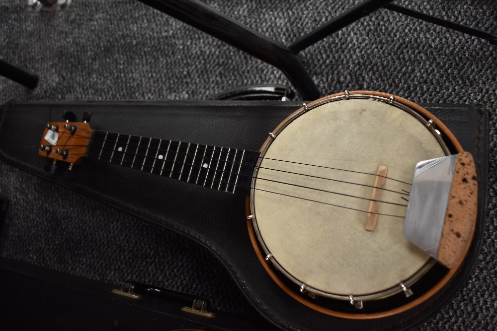 A traditional banjolele with case