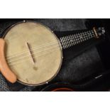 A traditional banjolele with case