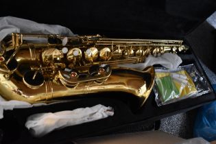 A Gear 4 Music Tenor Saxophone , model TS-100G, with fitted case and unbranded mouthpiece