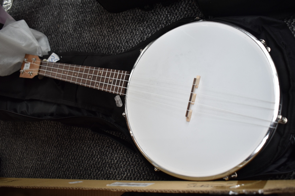 A modern banjolele with unmatched case