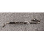 A Bundy by Selmer bass clarinet, with Vandoren Paris B44 mouthpiece, serial number 25736 with hard