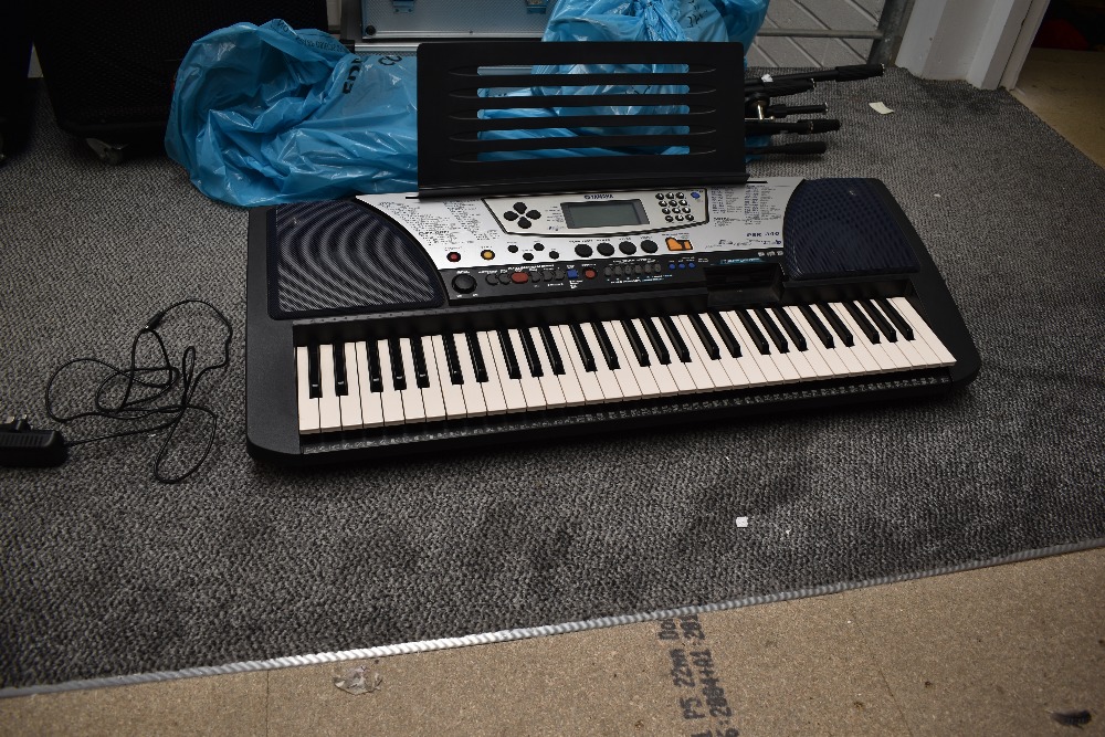 A Yamaha PSR-340 keyboard, with 12V power supply