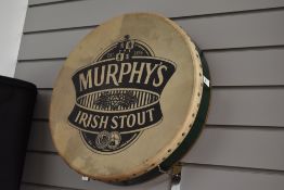 An Irish Bodhran, branded for Murphy's Irish Stout, with beater