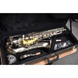 A FF (Fortissimo?) tenor saxophone in silvered finish with unbranded mouthpiece and hard case