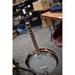 A modern 4 string banjo, Ozark with padded gig bag