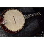 A traditional banjolele with case