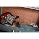 A vintage electric guitar, (Teisco) Tuxedo Three