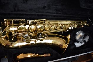 A Gear 4 Music Saxophone , with fitted hard case and unbranded mouthpiece