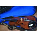 A composite violin having two piece 14inch back, no visible stamps, with vintage hard case