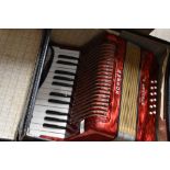 A vintage Hohner Piano Accordion , Student II model, with case