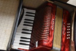 A vintage Hohner Piano Accordion , Student II model, with case