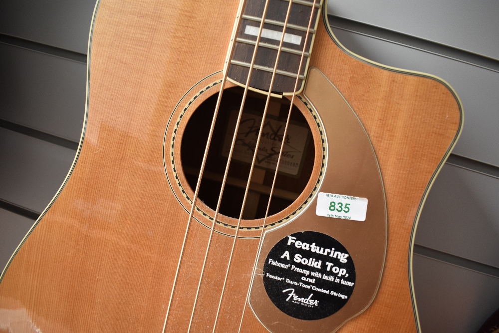 A Fender Kingman acoustic bass (has Fishman preamp), serial number CSE 12000492, please note had