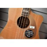 A Fender Kingman acoustic bass (has Fishman preamp), serial number CSE 12000492, please note had
