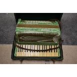 A vintage piano accordion , Settimio Soprani Three, in case