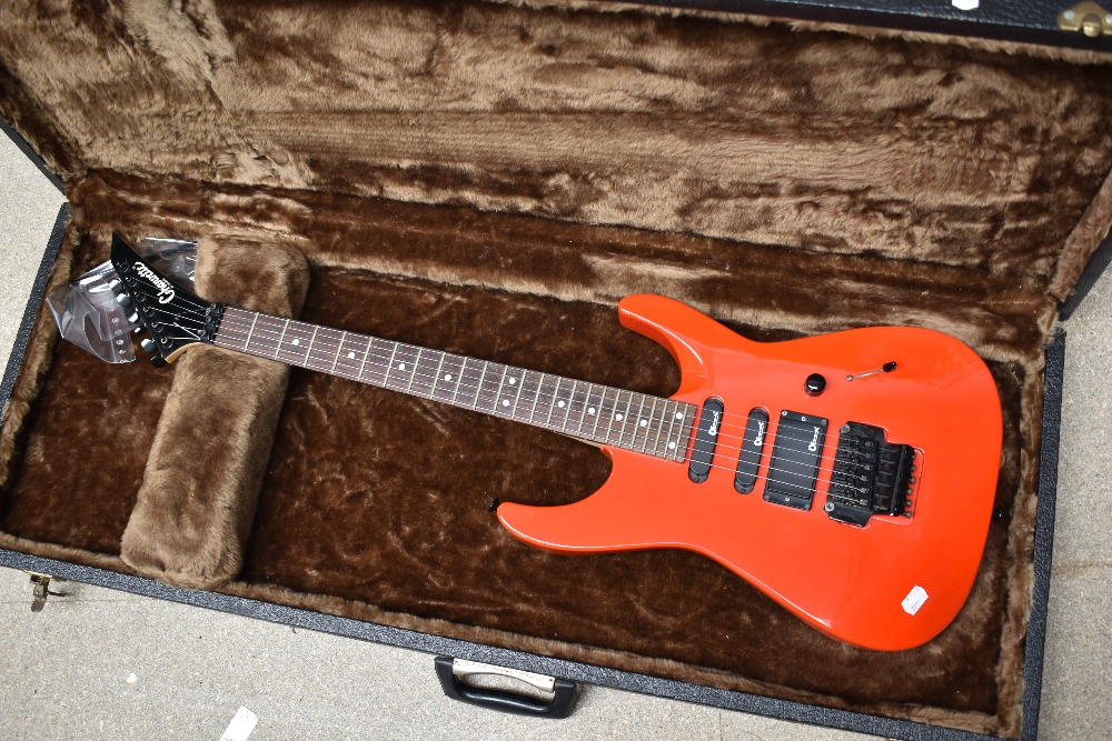 A Charvel Charvette electric guitar in fitted hard case