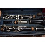 A Boosey and Hawkes student clarinet in vintage Clifford Essex & Sons case