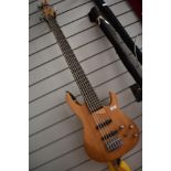 A Washburn 6 string electric bass guitar, model MB-6, serial number 9303219, please note lettering