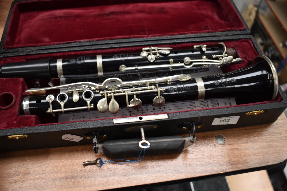 A vintage Prof Romeo Orsi clarinet in vintage hard case