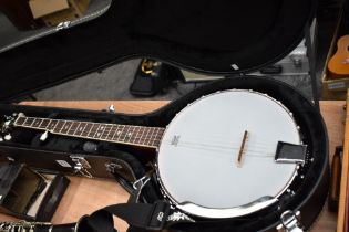 A modern banjo in hard case
