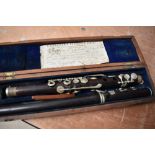 A 19th Century rosewood flute, Boosey and Co , Pratten's perfected , with fitted and labelled