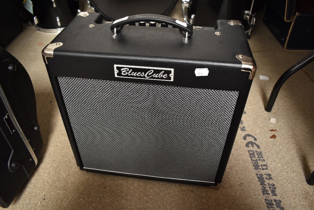 A Roland Blues Cube Hot amplifier, (33W 1 x 12)