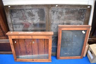 Two vintage noticeboards and a large wall display case