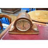 An early 20th Century napoleon mantel clock with marquetry decoration